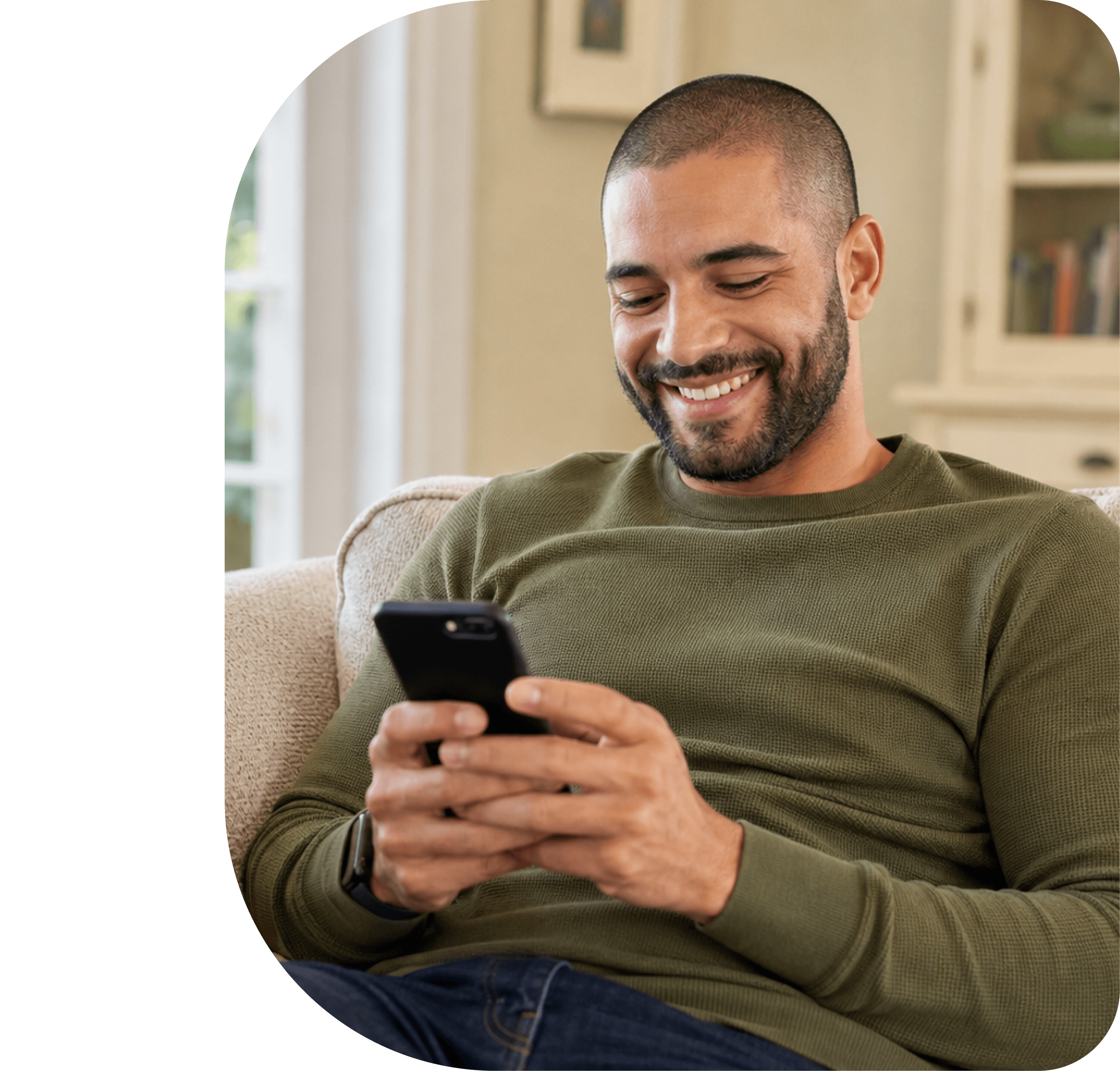 A relaxed customer booking a cook on their phone